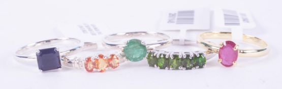 Five silver rings including orange sapphire, Russian diopside and set of three rings blue
