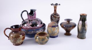 A collection of eight pieces of Doulton pottery including Lambeth jug, signed Ellin Palmer and