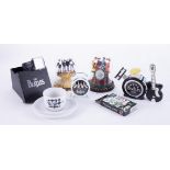 Small collection of Beatles memorabilia including a stainless steel wristwatch, small alarm clock,