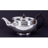 A Victorian silver teapot, London, maker I.T, stamped Green & Co, approx. 22.78oz.