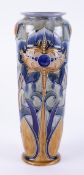 Frank Butler, a Doulton art pottery tall vase, impressed, height 36cm.