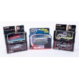 Corgi Classics, four boxed James Bond models together with another Corgi bus model (5).