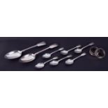 A set of six Victorian silver teaspoons and a pair of silver napkin rings (boxed), 2.74oz,