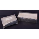 A silver rectangular cigarette box, 19cm x 9cm, together with another marked W.T.T & Co with