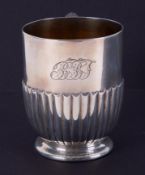 A Victorian silver christening cup, gilt lined with half fluted body, circa 1892, height 9cm, with