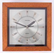 A Toshiba quartz wall clock.