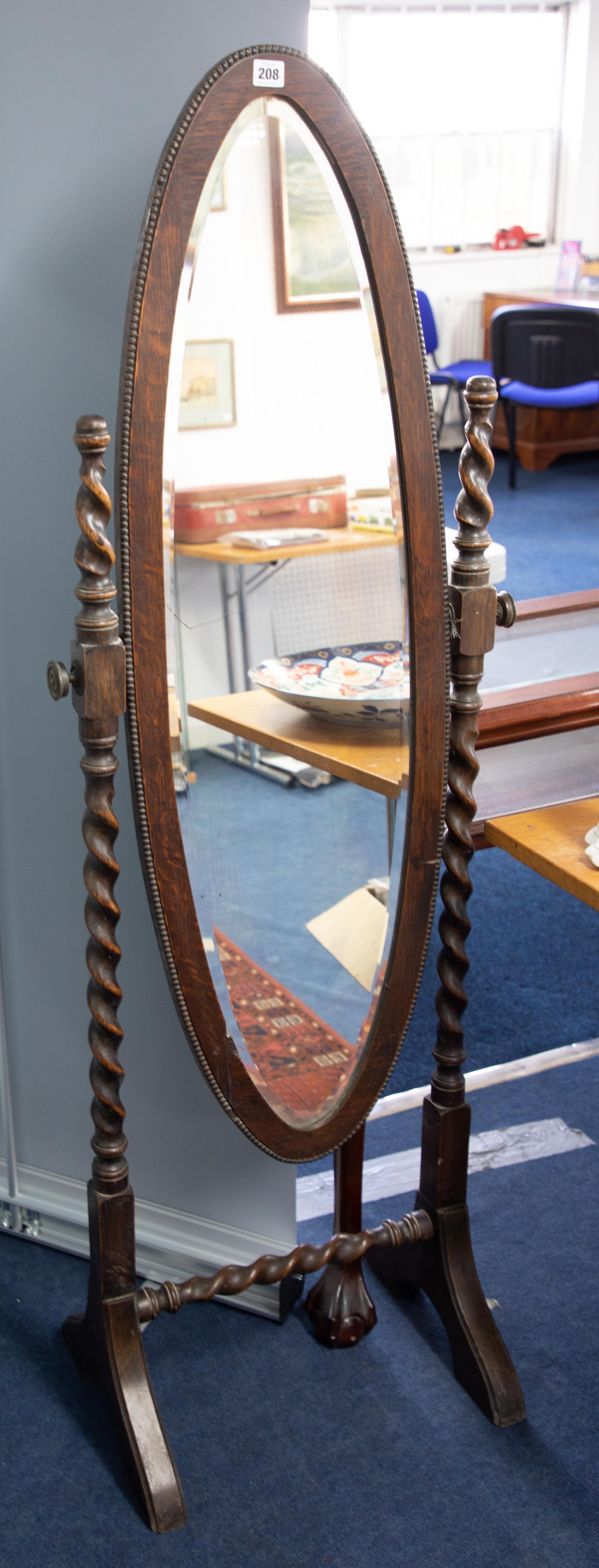 An oak & barley twist freestanding cheval mirror.