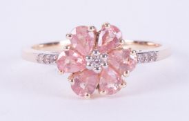 A 9ct yellow gold flower cluster ring set with 1.24 carats (total weight) of pear shaped