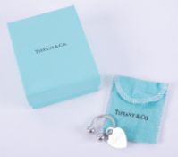 A silver Tiffany & Co heart keyring, the heart is stamped 925, 'Please Return To Tiffany & Co.,