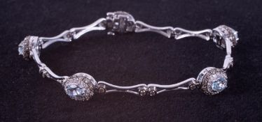 A 14ct white gold Le Vian link design bracelet set with oval cut aquamarines, total weight 2.50