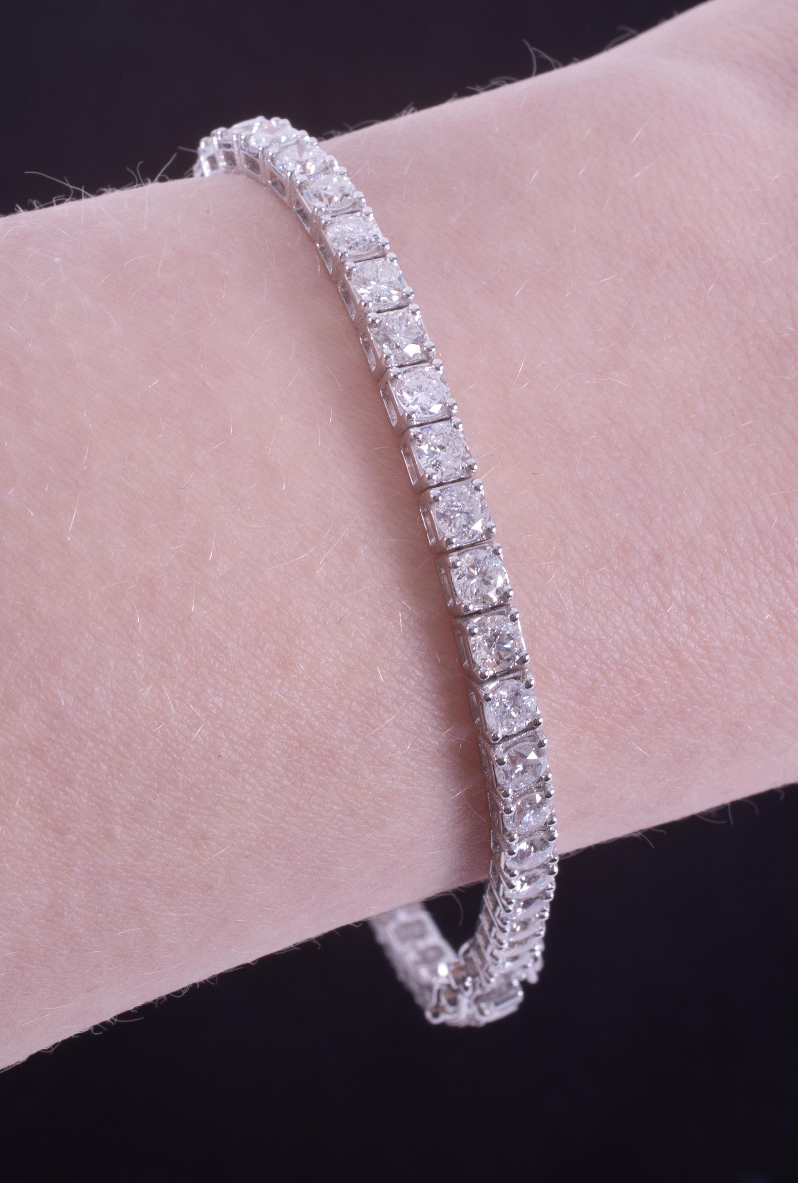 An 18ct white gold line bracelet set with approx. 7.20 carats of round brilliant cut diamonds, - Image 3 of 3