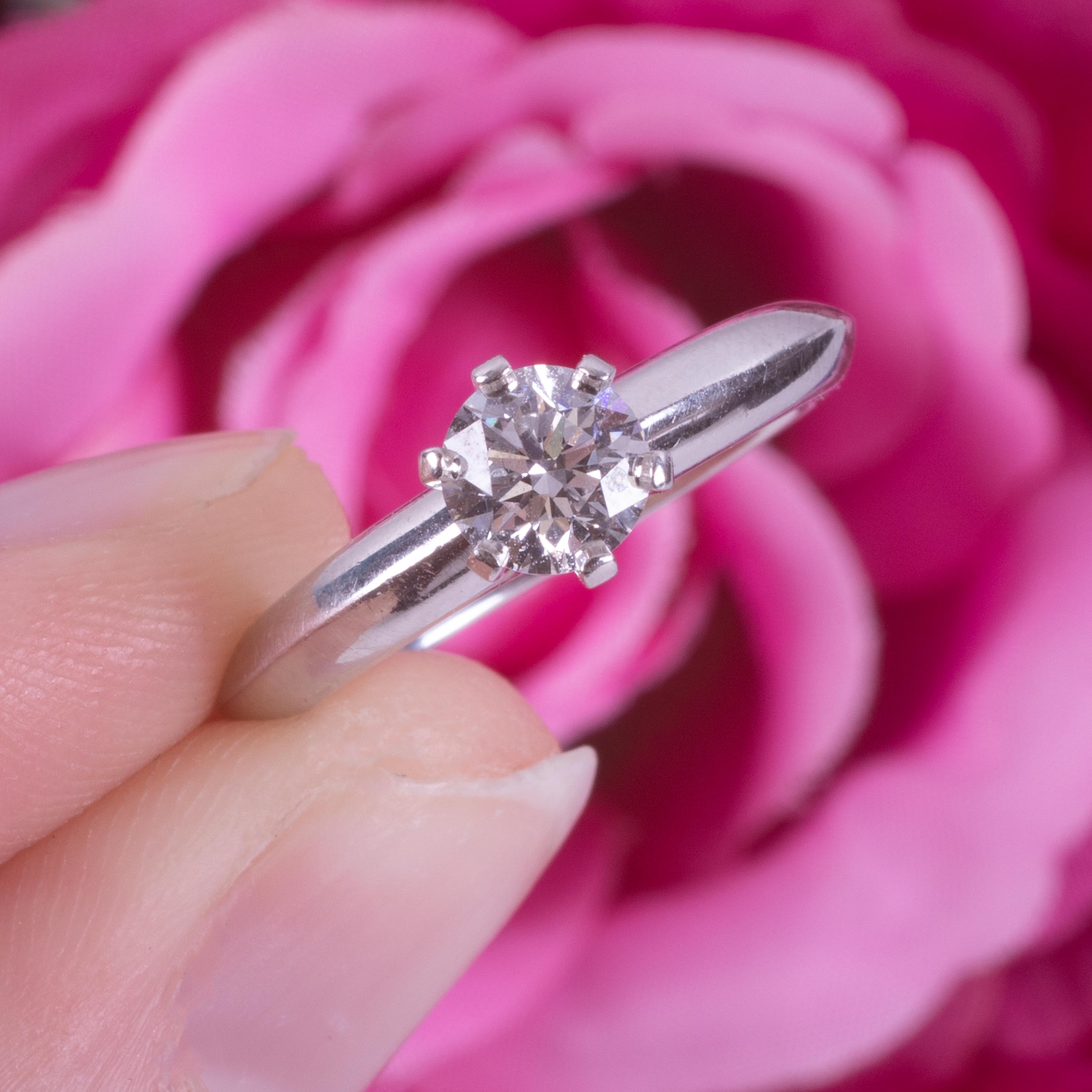 A platinum Tiffany & Co ring set with a round brilliant cut diamond, 0.51 carats, colour E and VS1 - Image 4 of 5