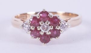 A 9ct yellow gold flower cluster design ring set with approx. 0.36 carats total weight of round