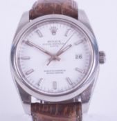 Rolex, a gents Oyster Perpetual Date stainless steel wristwatch, reference number 115200, serial