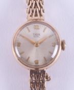 Tudor, a ladies 9ct yellow gold Tudor Royal manual wind wristwatch, the clasp is stamped