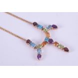 A 14ct yellow gold necklace set with multicoloured gemstones of different cuts including heart