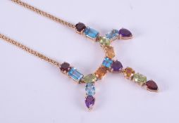 A 14ct yellow gold necklace set with multicoloured gemstones of different cuts including heart