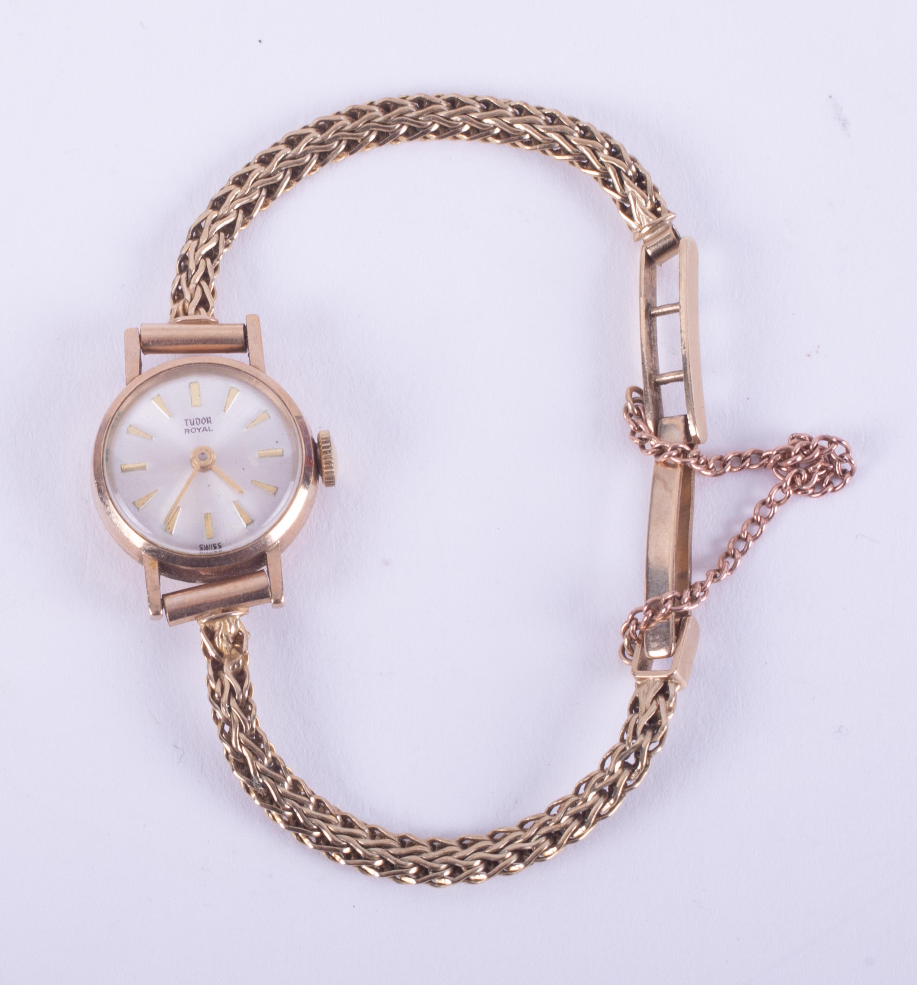Tudor, a 9ct yellow gold ladies Tudor Royal wristwatch with safety chain, 10.73gm.