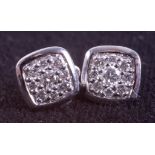 A pair of 9ct white gold square design stud earrings set with a total weight of 0.30 carats of round