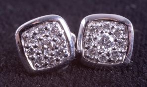 A pair of 9ct white gold square design stud earrings set with a total weight of 0.30 carats of round