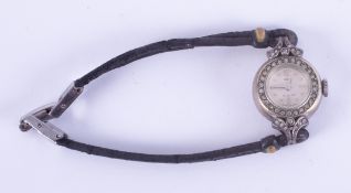 Tudor, a ladies vintage Tudor cocktail watch with paste stones surrounding the dial & a split