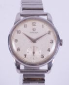 Omega, a stainless steel gent's vintage Omega manual wind wristwatch on a stainless steel fixo-