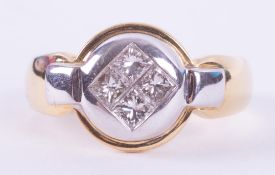An 18ct yellow & white gold ring set with four princess cut diamonds, total weight approx. 0.72