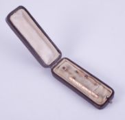 A box containing a 9ct rose gold engraved bar brooch, length 4.5cm, 2.33gm, a 9ct rose gold bar