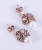 A pair of antique 9ct yellow gold bow design drop earrings set with a 7mm cultured pearl, round