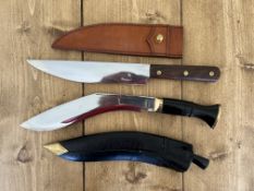 A 2008 Kukri blade, 26cm length together with a replica of an old Bowie knife, 26cm length.