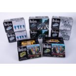 The Beatles, a collection of eight boxed Beatles diecast collectable models.
