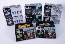 The Beatles, a collection of eight boxed Beatles diecast collectable models.