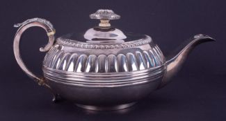 A Georgian silver squat teapot with acanthus scroll handle, London hallmark, letter b 1817-18,