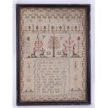 An 18th century needlework sampler decorated with the alphabet, verse and symbols of stylised