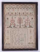 An 18th century needlework sampler decorated with the alphabet, verse and symbols of stylised