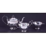 A Sheffield silver three piece tea service, E.Viner, approx. 21.48oz.