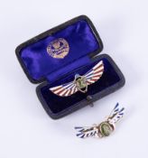 Two 12ct yellow gold Military 'Sweetheart type' brooches, one set with an oval cut peridot & blue,