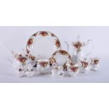 A collection of Royal Albert 'Old Country Roses' including Plates, salt and pepper pots, cups and