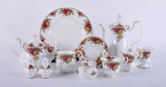 A collection of Royal Albert 'Old Country Roses' including Plates, salt and pepper pots, cups and