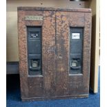 An early 20th Century postage stamp machine, height 55cm.