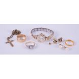 A mixed lot to include a 9ct yellow gold wedding band, 3.26gm, a 22ct yellow gold wedding band, 2.