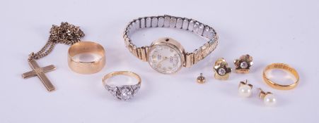 A mixed lot to include a 9ct yellow gold wedding band, 3.26gm, a 22ct yellow gold wedding band, 2.