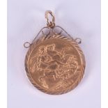 A full gold sovereign, 1911 George IVS in a gold pendant mount, 9.66gm.