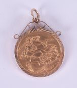 A full gold sovereign, 1911 George IVS in a gold pendant mount, 9.66gm.