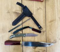 Larenzo Bowie knife together with other knives.