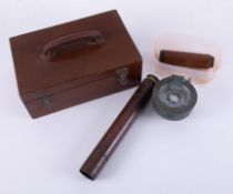 A mixed lot comprising a brass vintage two pull telescope, hand bearing compass and handle and