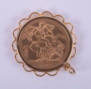 A full gold sovereign, 1884 Victoria in a gold pendant mount, 9.45gm.