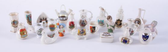 A mixed collection of crested chinaware, also three porcelain pin cushion doll heads, approx. 21.