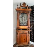A rare Victorian German Alder coin operated Polyphon music player, with rare large 65.50cm discs,