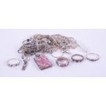 A small mixed lot of silver & costume jewellery including necklaces, rings, chains, etc.